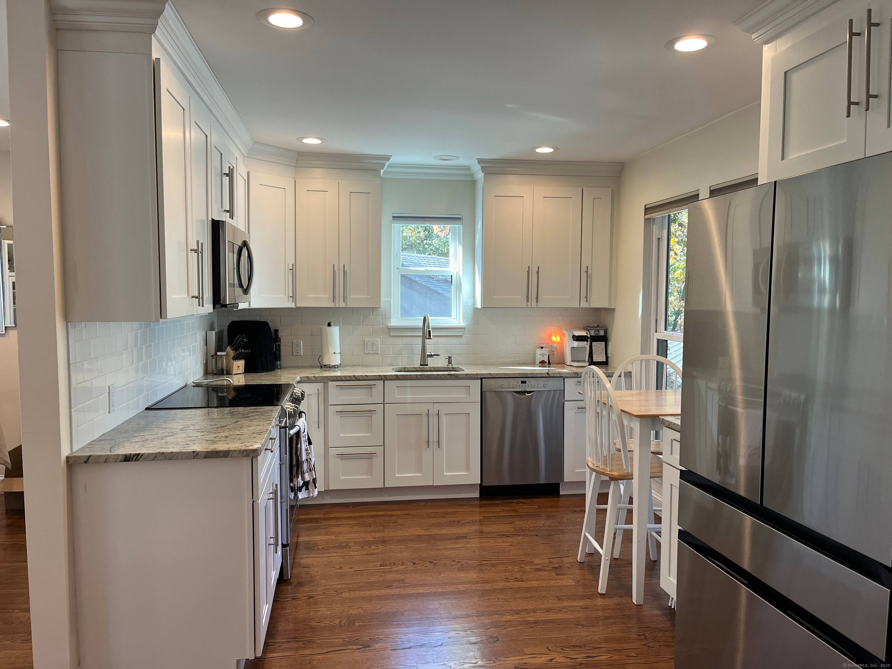 Experience the perfect blend of comfort and style in this beautifully remodeled end unit condo, ideally located in the highly desirable Farmington Woods community.