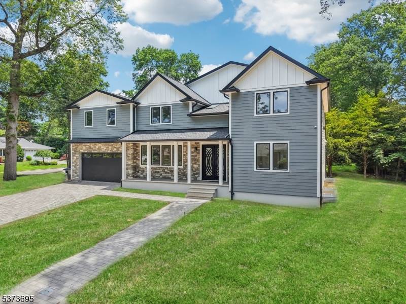 Spectacular new construction on existing footprint in Oradell's highly desirable Latchstring section.
