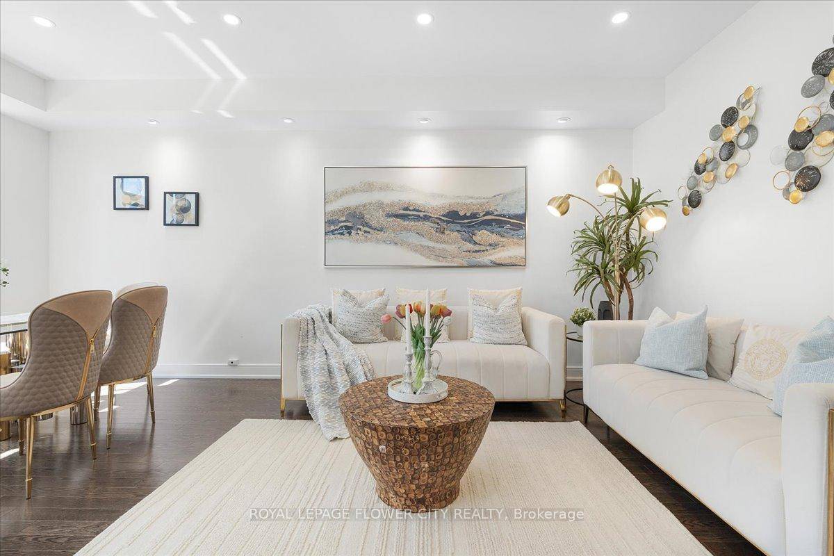Executive end unit townhome on a quiet cul de sac, offering 2, 578 sq ft of beautifully finished living space across 4 levels !
