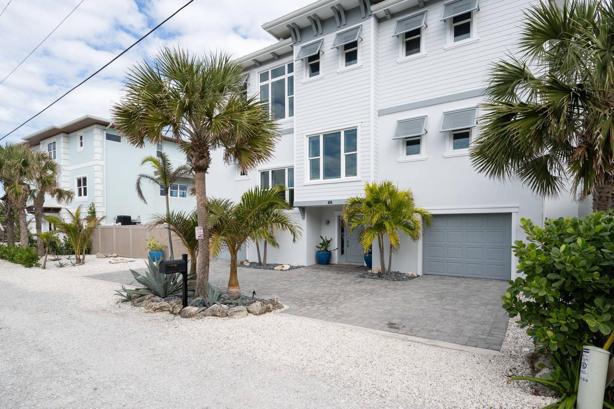 Experience unparalleled oceanfront living in this meticulously designed coastal retreat, nestled on an exclusive stretch of shoreline.