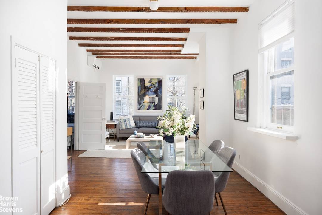 Built in Greek revival style during the early 1800s, The Landmark Preservation Commission recognized this row of Vinegar Hill townhouses as a protected Historic Landmark District in 1997.