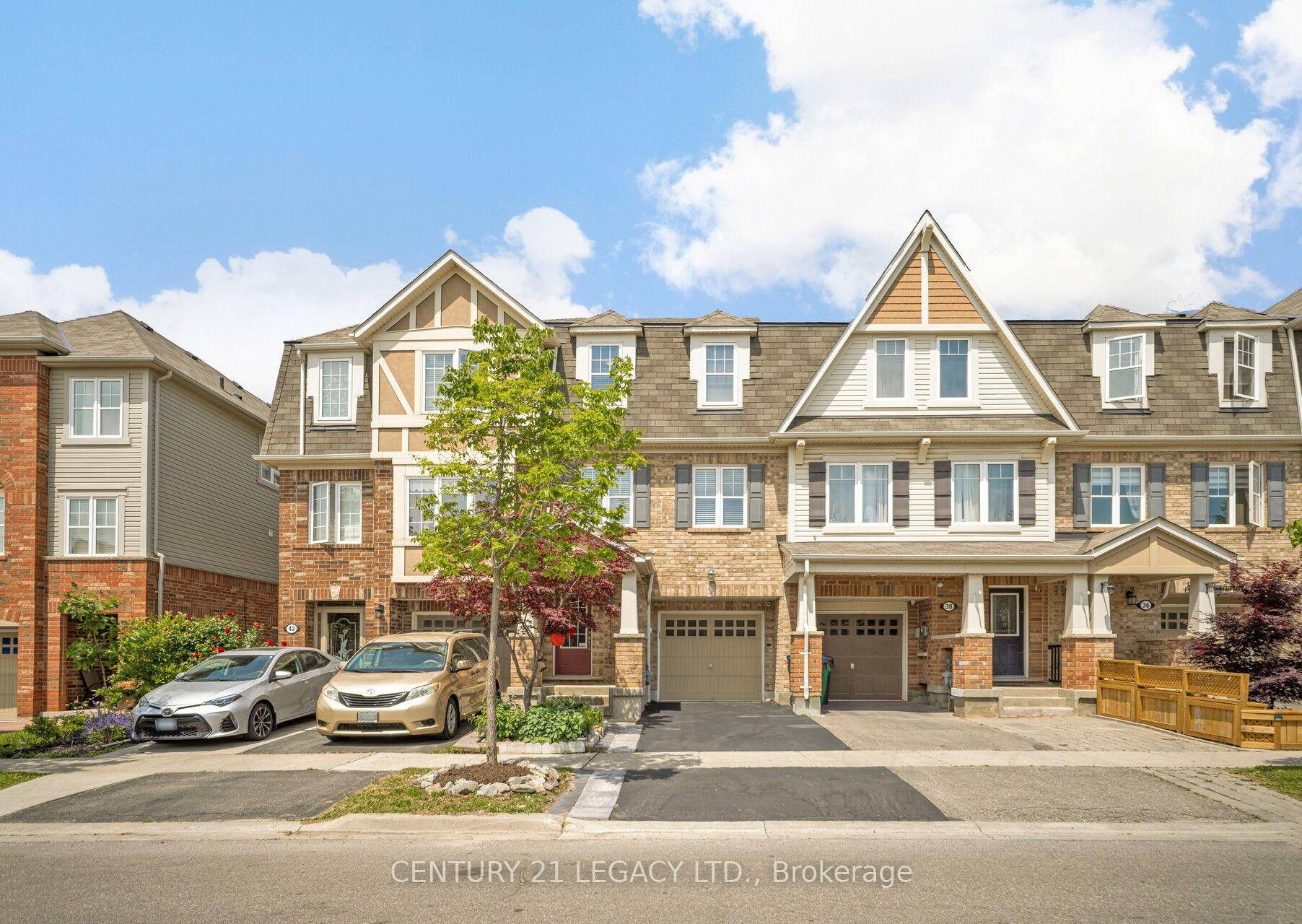 Absolutely Stunning, Immaculate 3 bedroom Freehold Townhouse diagonally across Park.