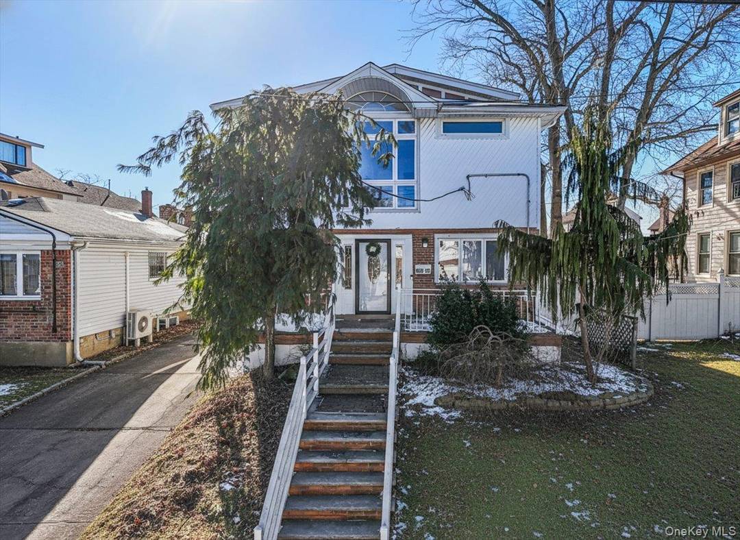 Located In The Beechhurst Section Of Whitestone, This Updated Contemporary Residence Offers An Open Concept Kitchen With Quartz Countertops, Seamlessly Connected To The Living And Dining Areas, Creating A Versatile ...