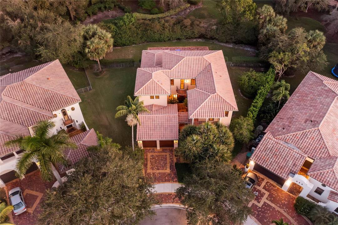 Rare extended Kiaora model situated on a private 16, 000 square foot pie shaped lot in Parkland Golf amp ; Country Club.