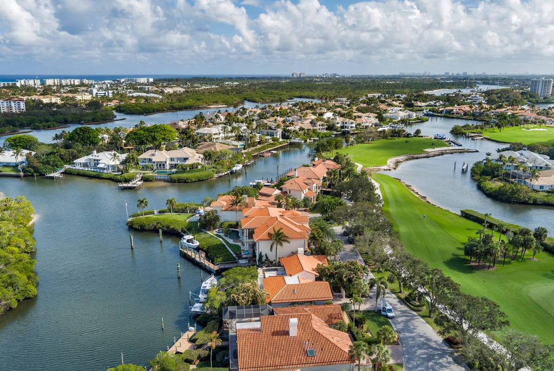 Stunning Intracoastal Estate with 100 Foot Dock in Gated Jonathan's Landing Perfectly positioned within the prestigious gated community of Jonathan's Landing, this extraordinary waterfront estate offers over 6, 185 square ...