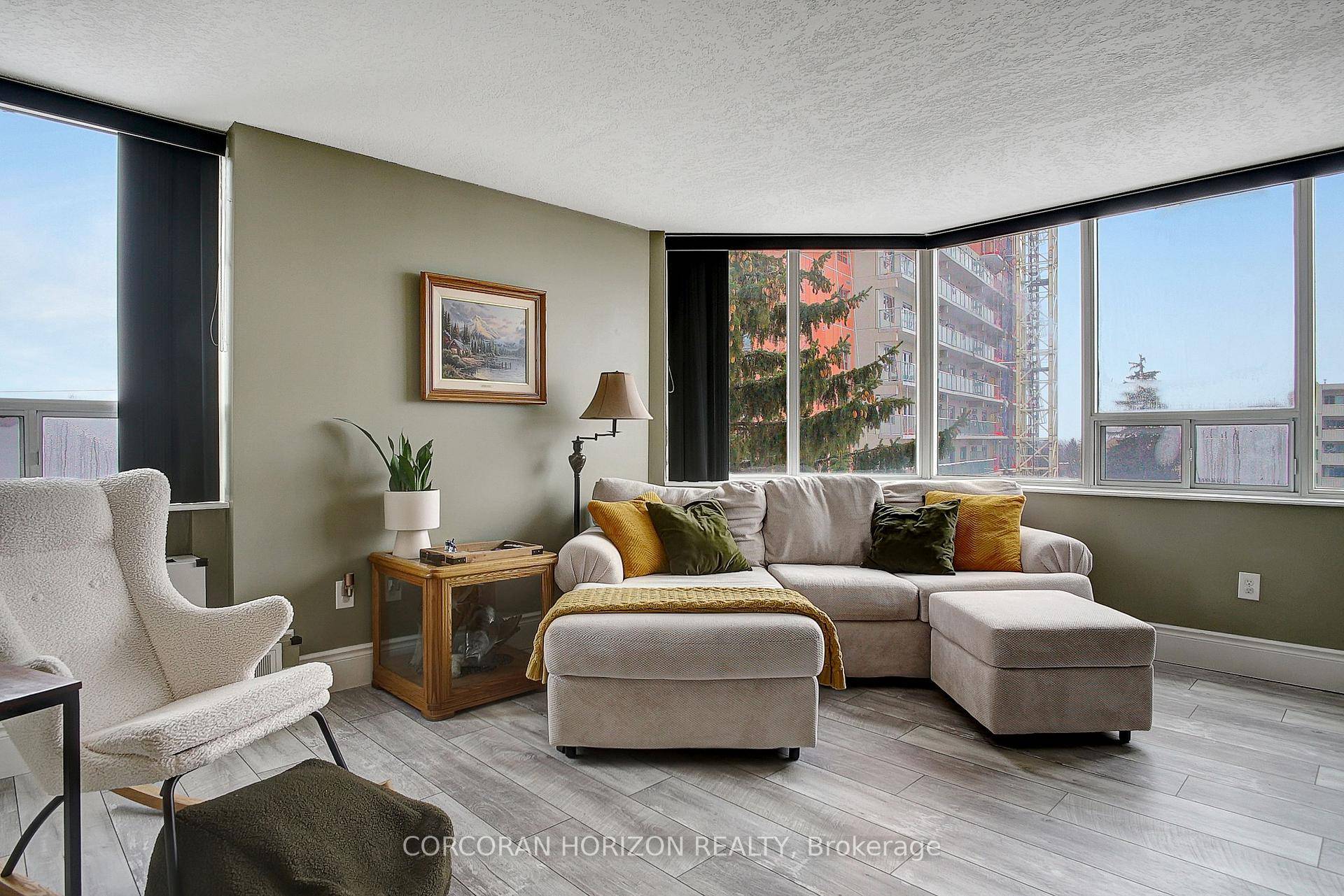 Welcome to 409 3227 King St E, an executive corner unit designed for modern comfort and convenience.