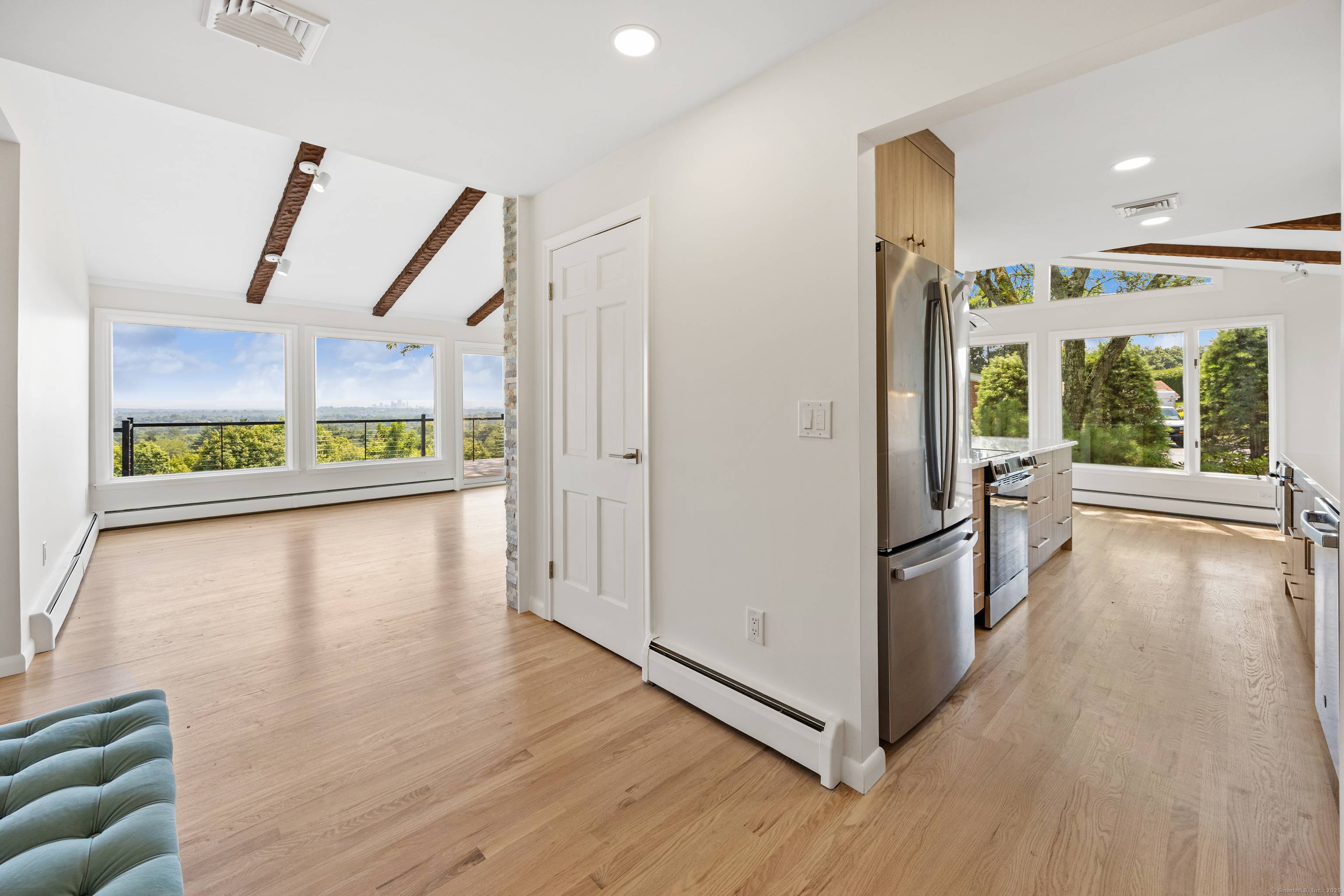 Welcome to 124 Ferncliff Drive where every day starts and ends with jaw dropping Hartford skyline views.