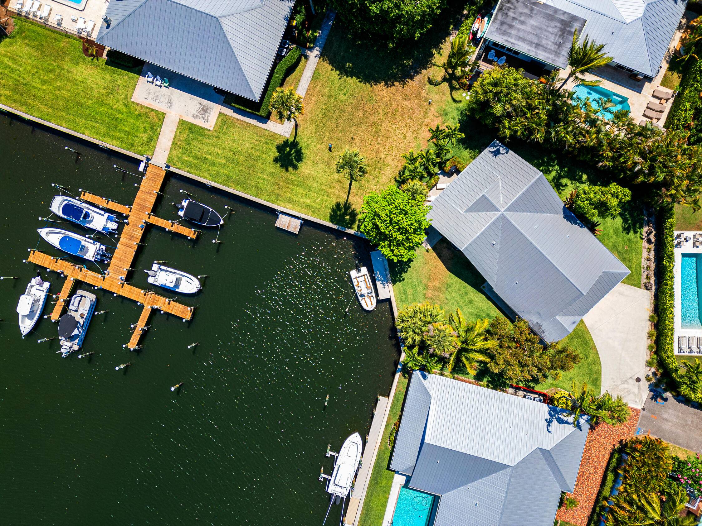 Experience the best in waterfront living at The Harbour at Hobe Sound a quiet, well established coastal neighborhood ideal for those who cherish serene water views and the boating lifestyle.