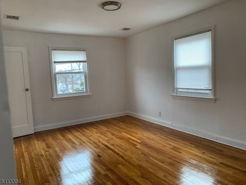 Charming two family home in a two story half of a quadruplex.