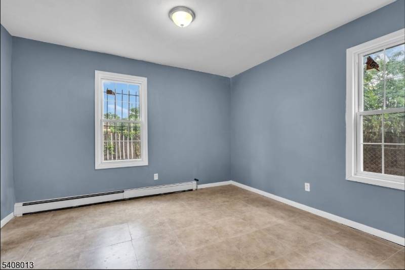 This 9 bedroom, 5 bath unit offers a functional layout with a bright living area, an eat in kitchen with ample cabinet storage, and well sized bedrooms with natural light.