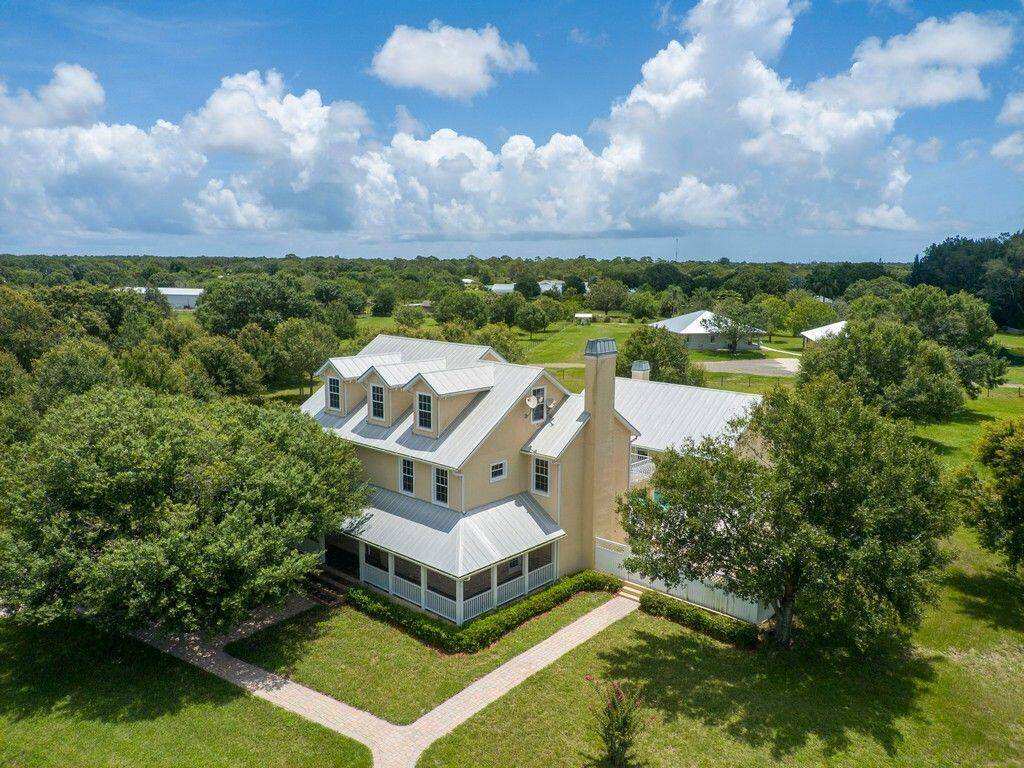 Welcome to this exquisite private, one of a kind custom 5 bedroom, 4.