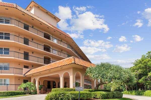 Exquisitely upgraded 2 bedroom first floor corner condo with long view of marina and intracoastal waterway.