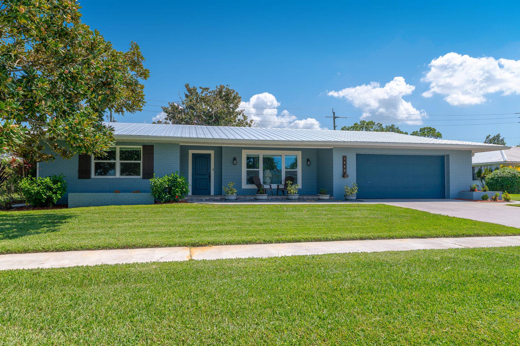 Welcome to this charming home with newer metal roof 2020, impact windows and doors 2019, tankless gas water heater 2020, A C 2021, offering 4 bedrooms, 2 bathrooms and 2 ...