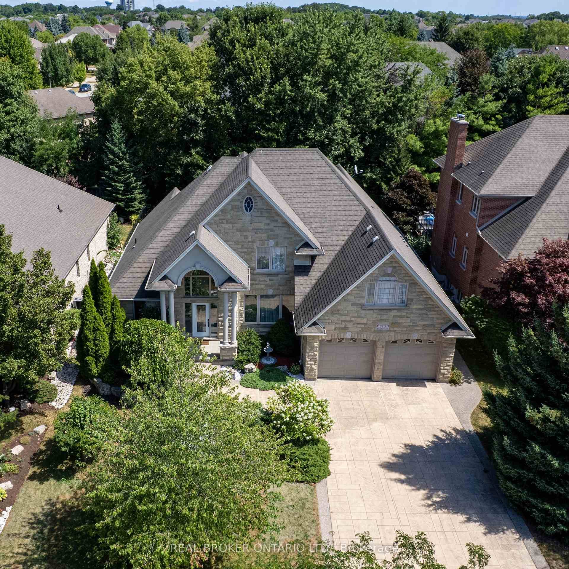 Welcome to 215 Black Maple Court, a fully reimagined custom bungaloft that unites French inspired design with refined, modern living.