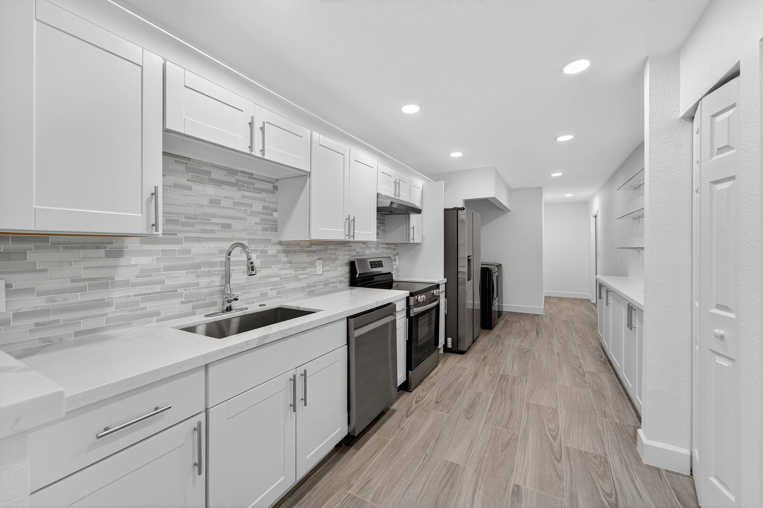 FULLY REMODELED with BRAND NEW ROOF single family home in Jupiter.