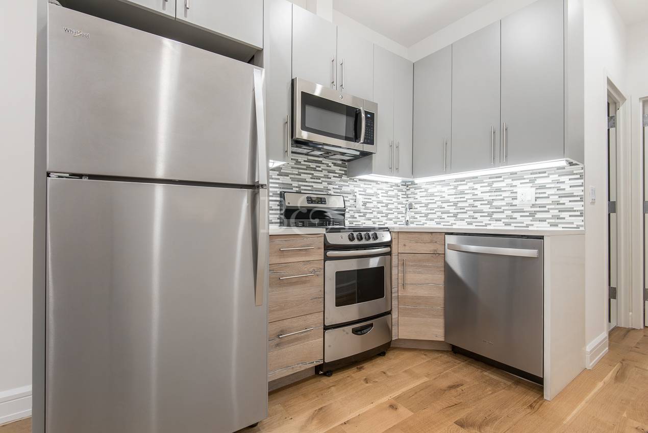 OUR OPINION This renovated apartment features recessed lighting, tall ceilings, up to date finishes, a modern kitchen and skylights.