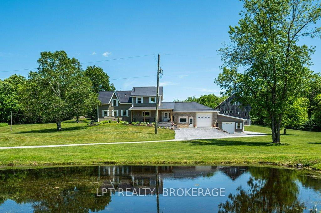 1758 Forty Foot Road, Godfrey, Ontario is a stunning countryside retreat that perfectly blends rustic charm with modern comfort, all set on an expansive 20.