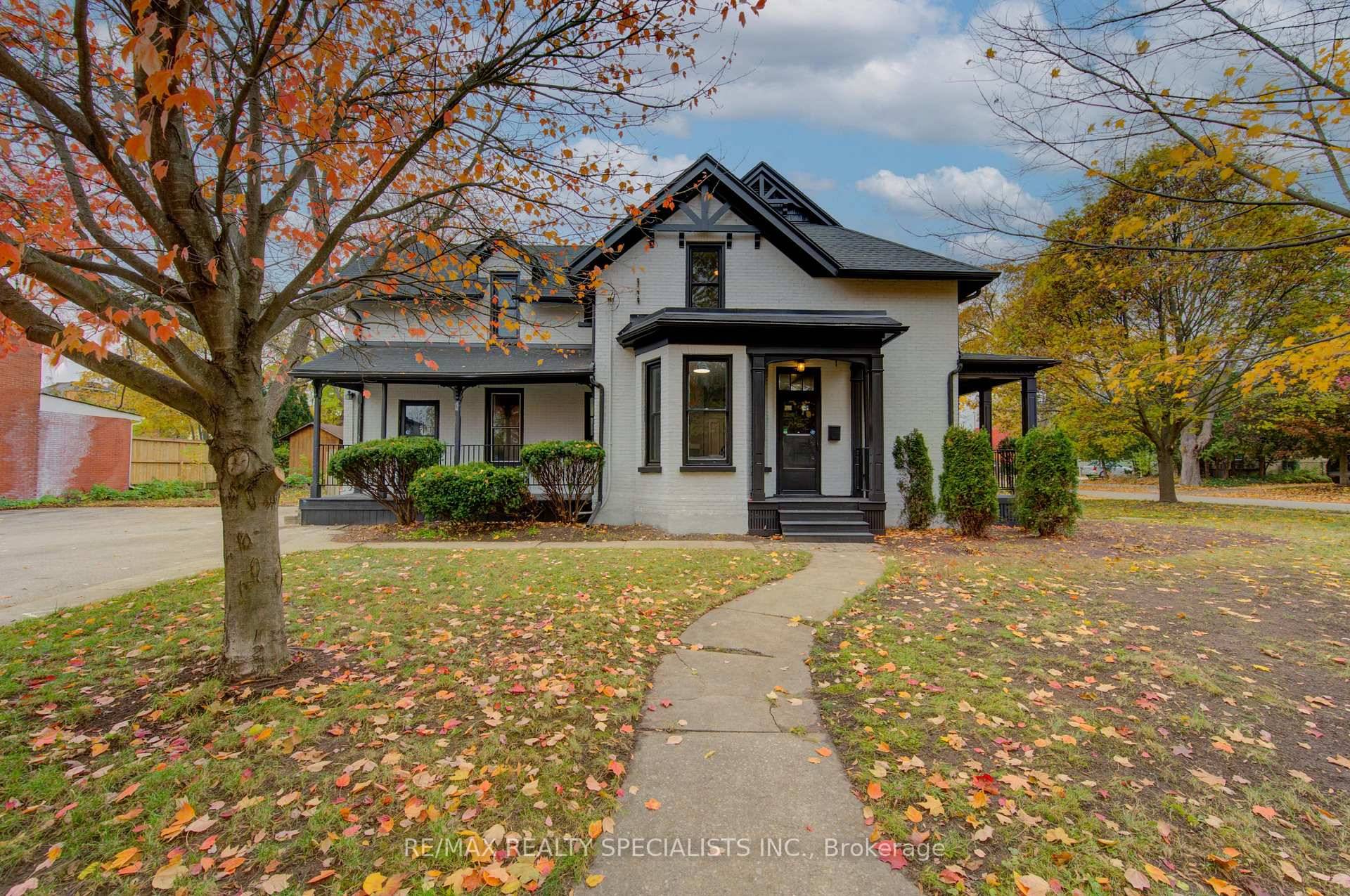 Discover the perfect blend of historic charm and modern upgrades in this beautifully refreshed century home, ideally situated on a premium corner lot near downtown Cambridge.
