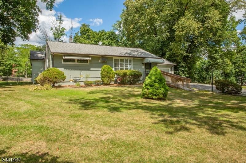 Welcome to this inviting ranch style home that combines warmth, space, and opportunity.