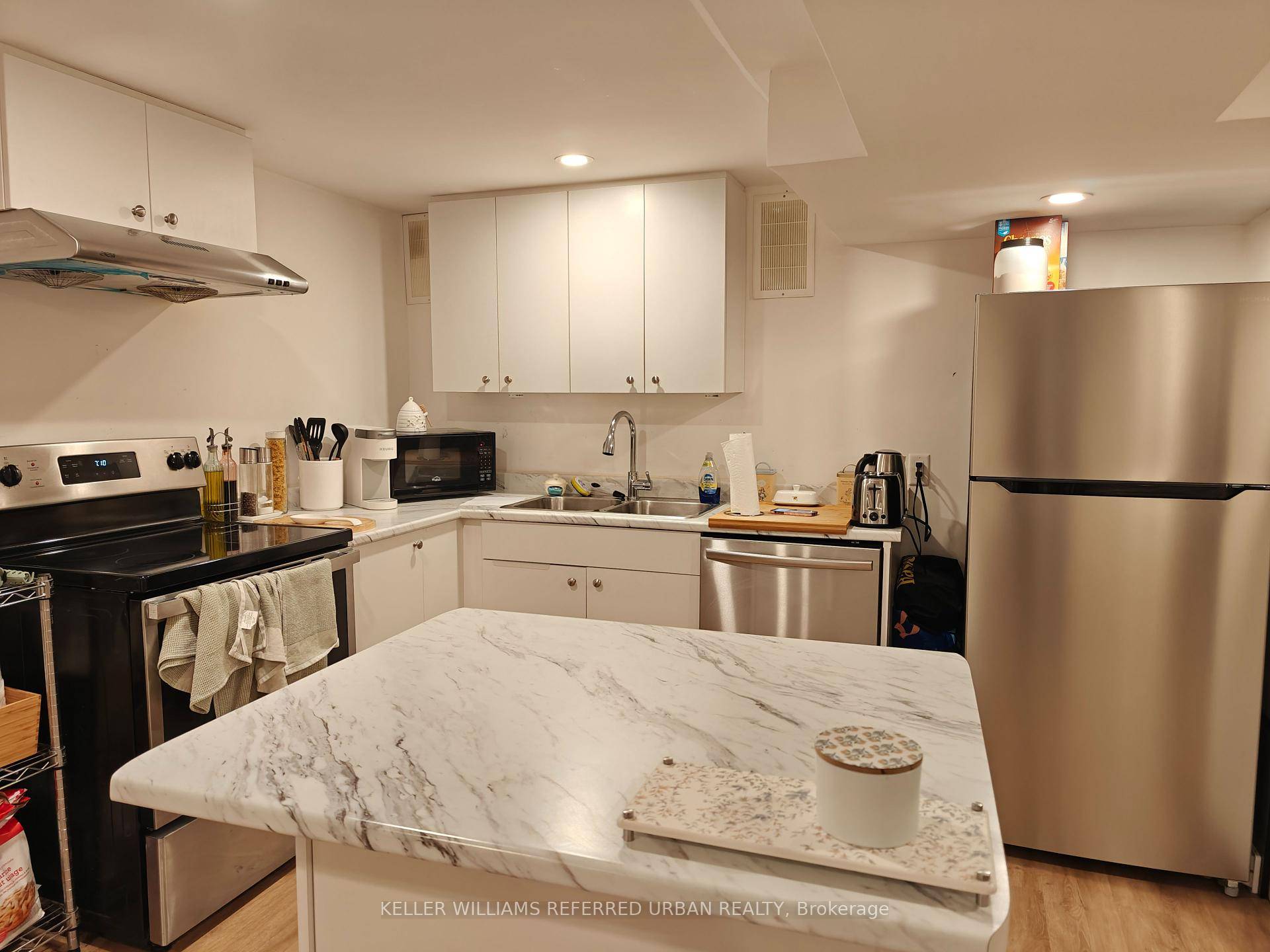 Welcome to this bright and well maintained 2 bedroom den basement apartment situated in a quiet, family oriented neighborhood in the heart of North York.