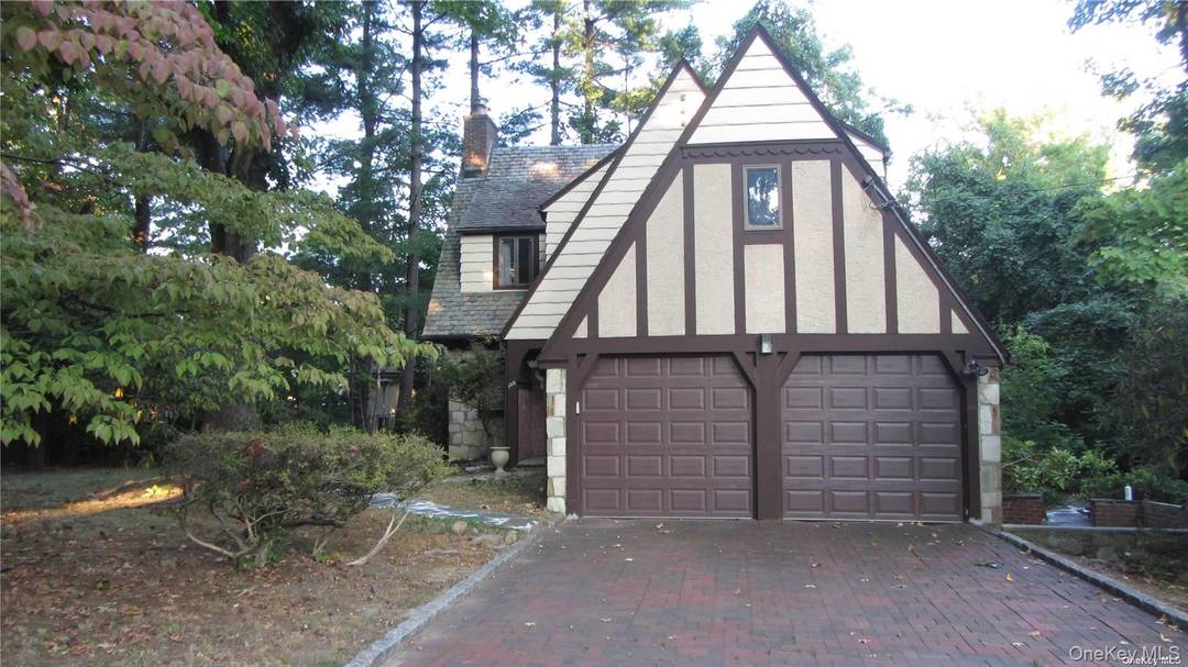 Great Neck North SD, Beatiful Tudor, Wood Floors, 3 Large Bed Rooms 2 Full Baths, 2 Half Baths.