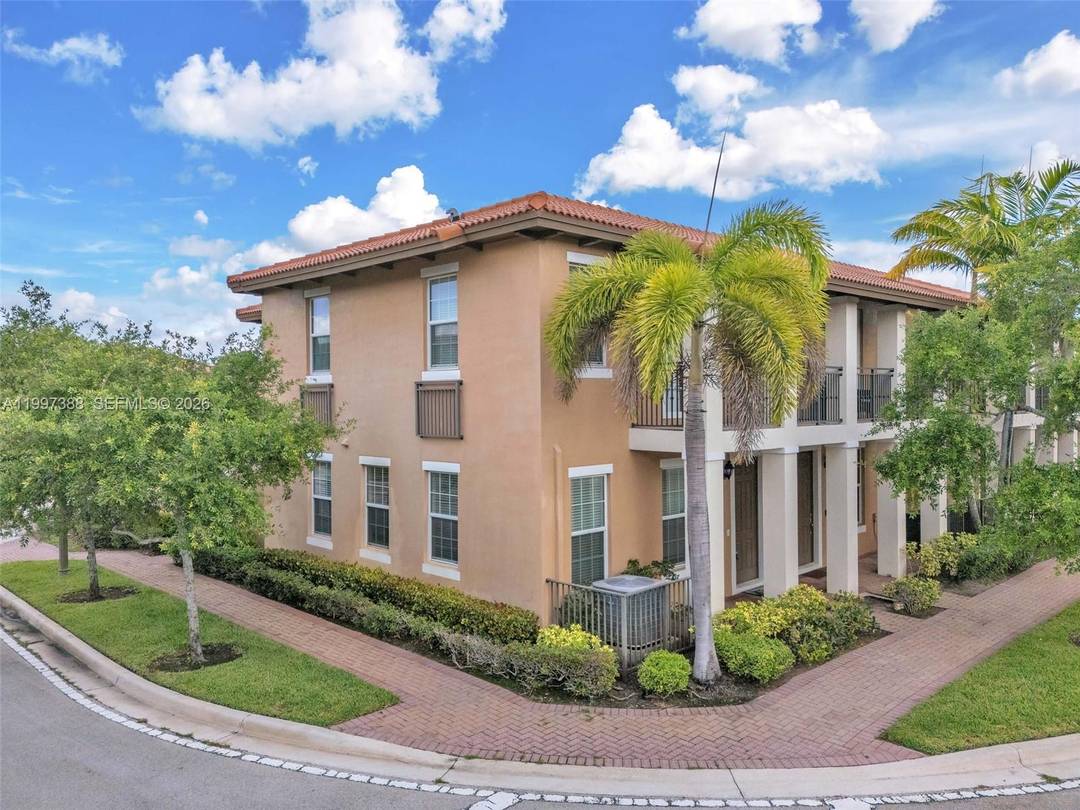 Beautiful Mediterranean style town home in the exclusive, manned gated community of Cobblestone in Western Pembroke Pines.