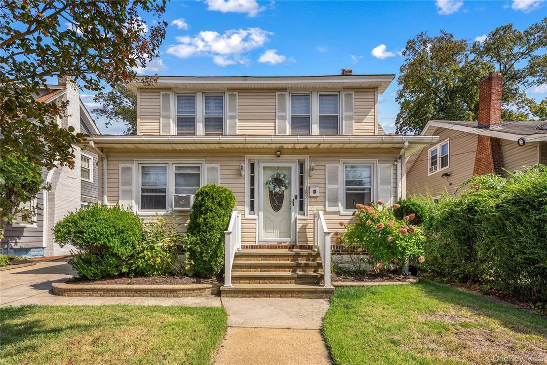Welcome to this beautifully maintained 1918 Colonial offering timeless charm and modern convenience.
