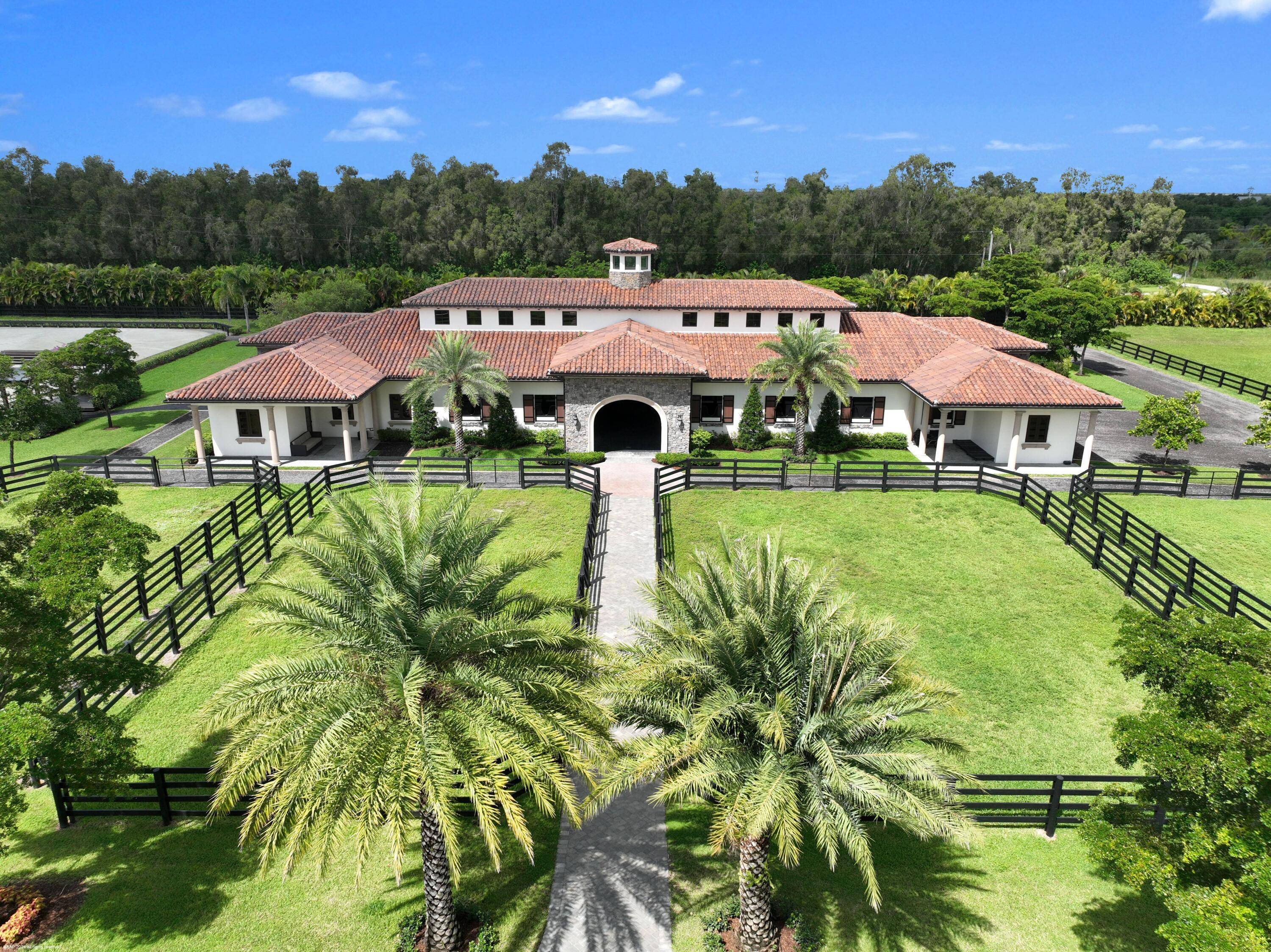 11 potentially up to 13 extra large stalls 14x14 available in this new exclusive barn in gated Palm Beach Point.