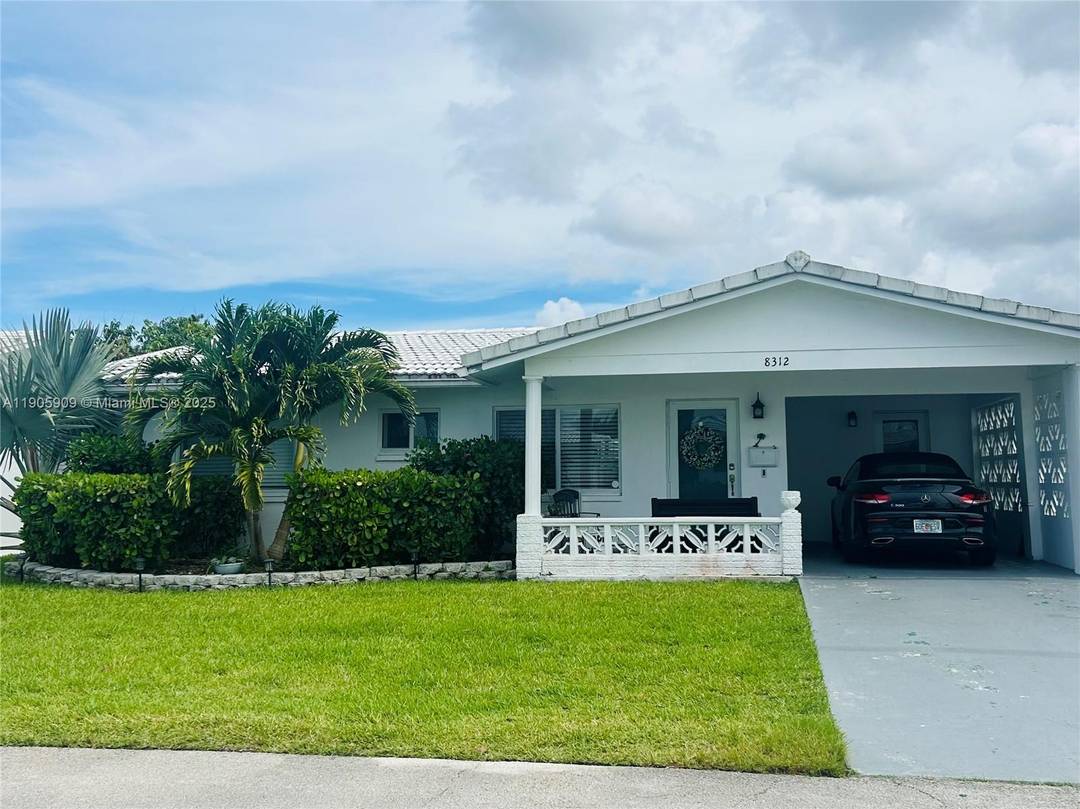 This is easily one of the best located homes in the Mainlands of Tamarac offering stunning open water views from your own spacious private terrace.