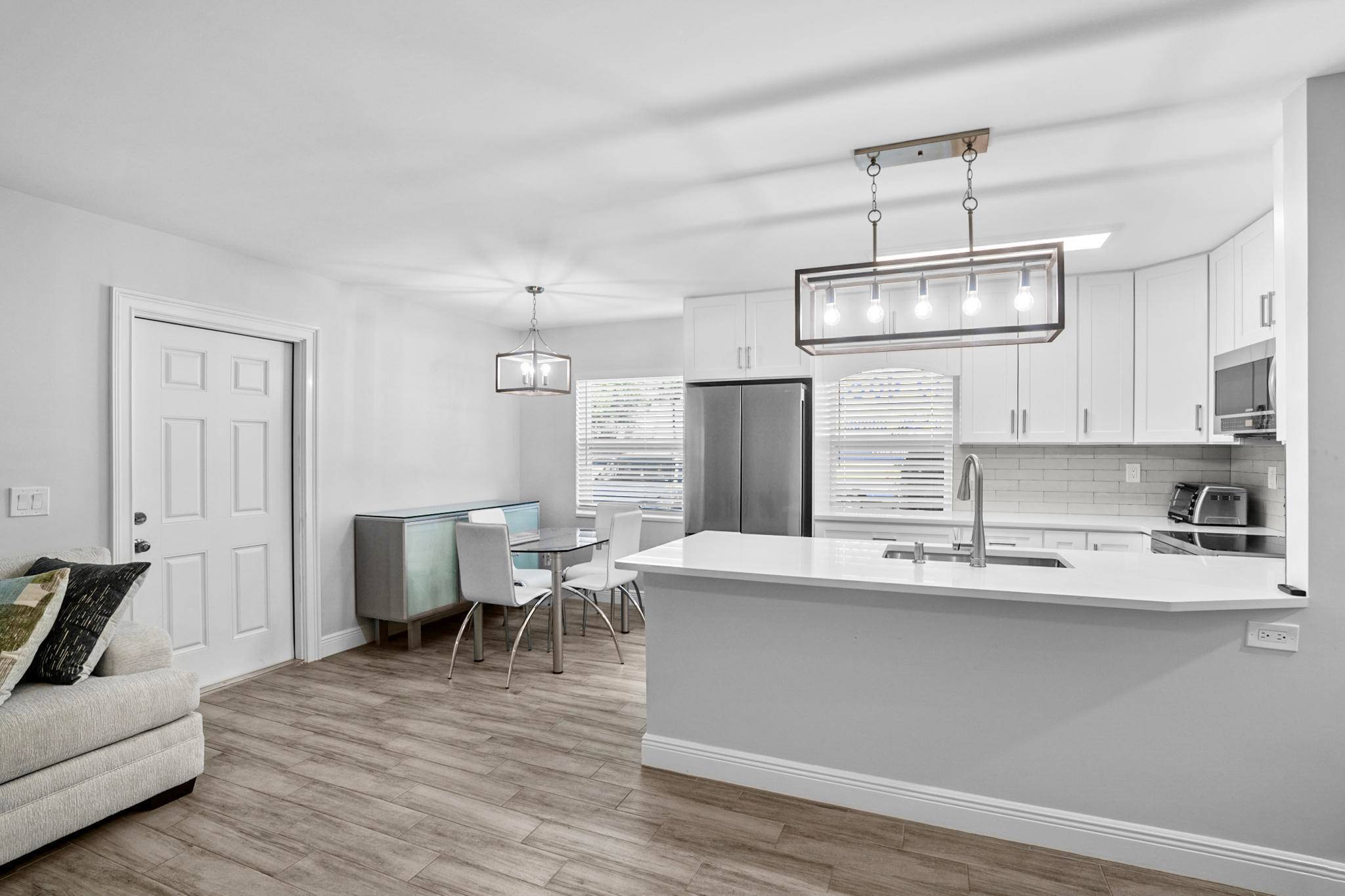 Stunning fully renovated corner unit in the gated 55 Kings Point community !