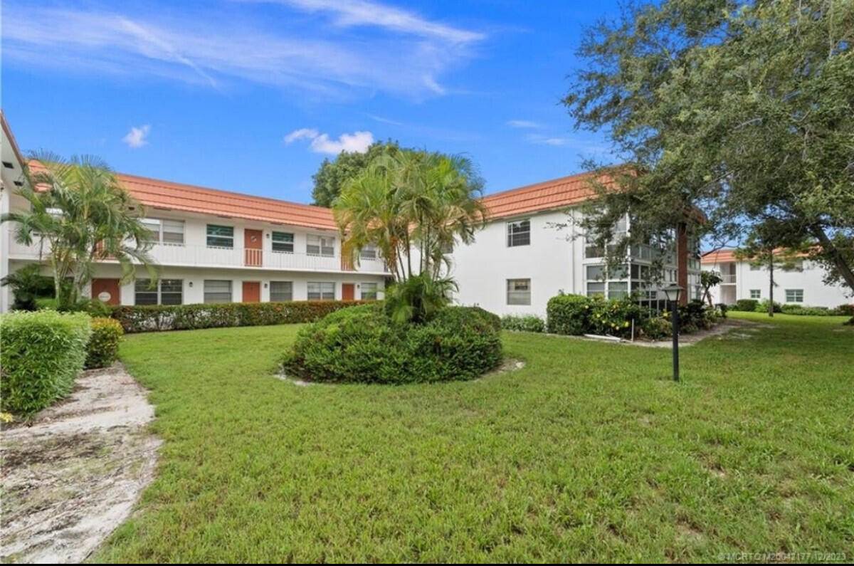 First Floor End Unit Light and Bright 2 2 with lots of upgrades including non slip tile floors throughout.