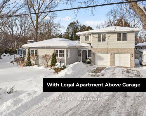 Tucked away in the highly sought after Wood River Acres community of Sutton, this expansive legal duplex offers the best of both worlds in town convenience with a serene, country ...