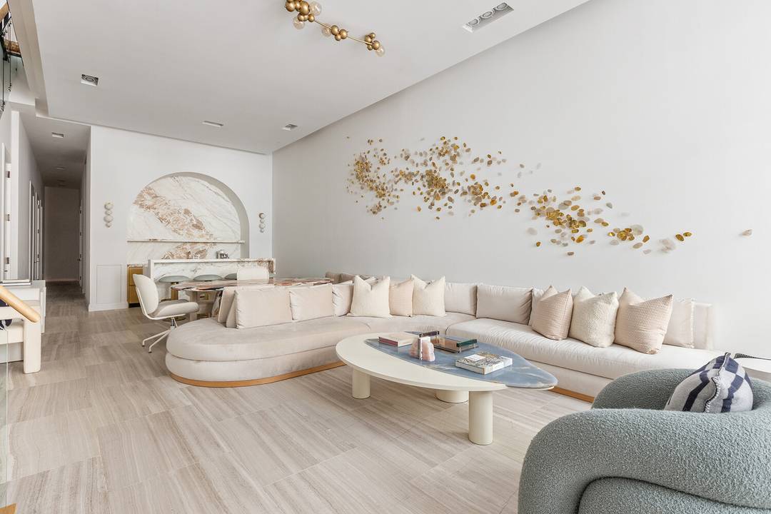 Across the street from Balthazar, in the heart of SoHo, an AD 100 Gut Renovated mansion sized CONDO, with incredibly low monthlies, awaits on Spring Street.