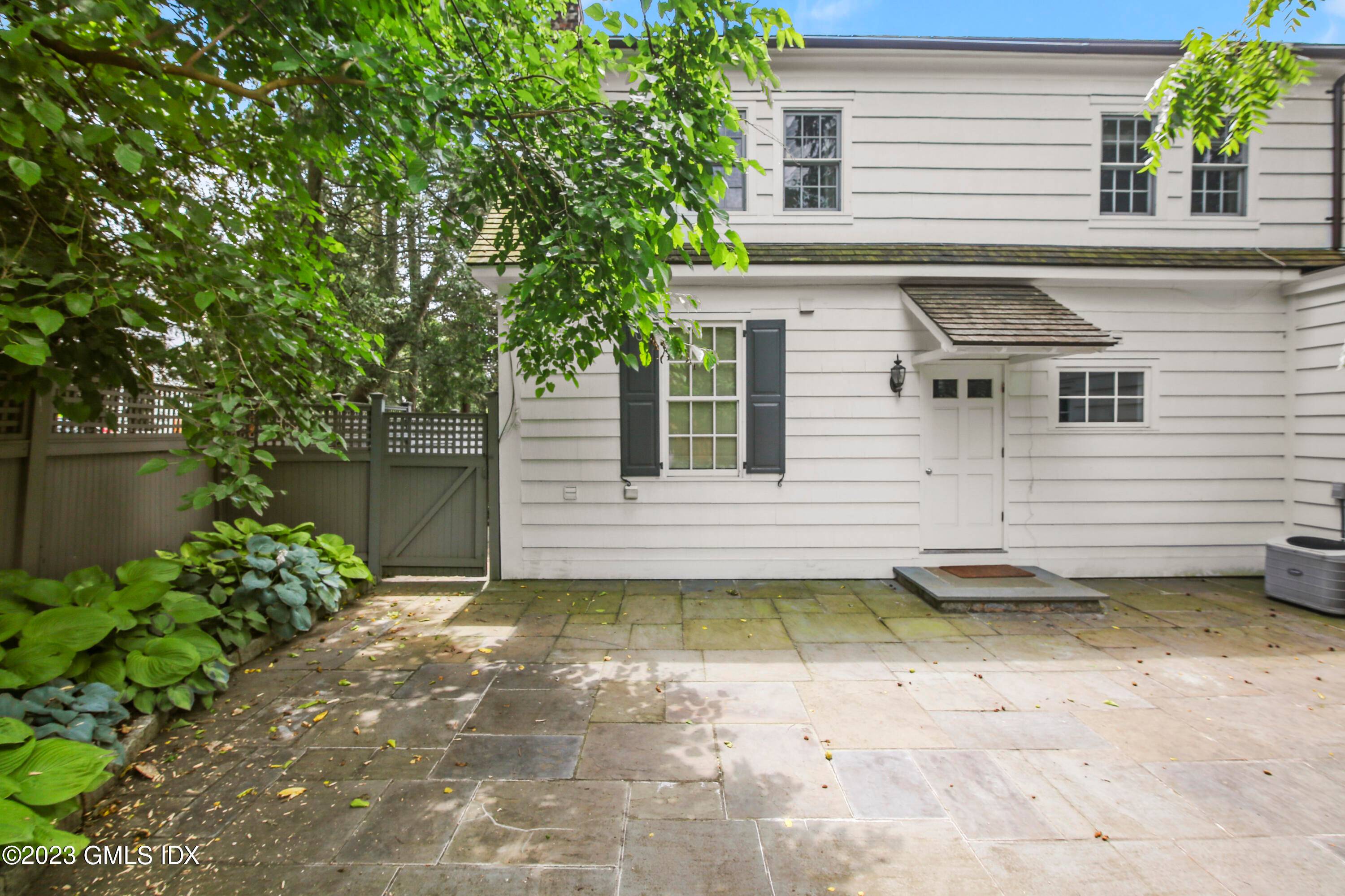 Belle Haven Association updated charming 3 bedroom cottage with living room, eat in kitchen and private stone patio for entertaining.