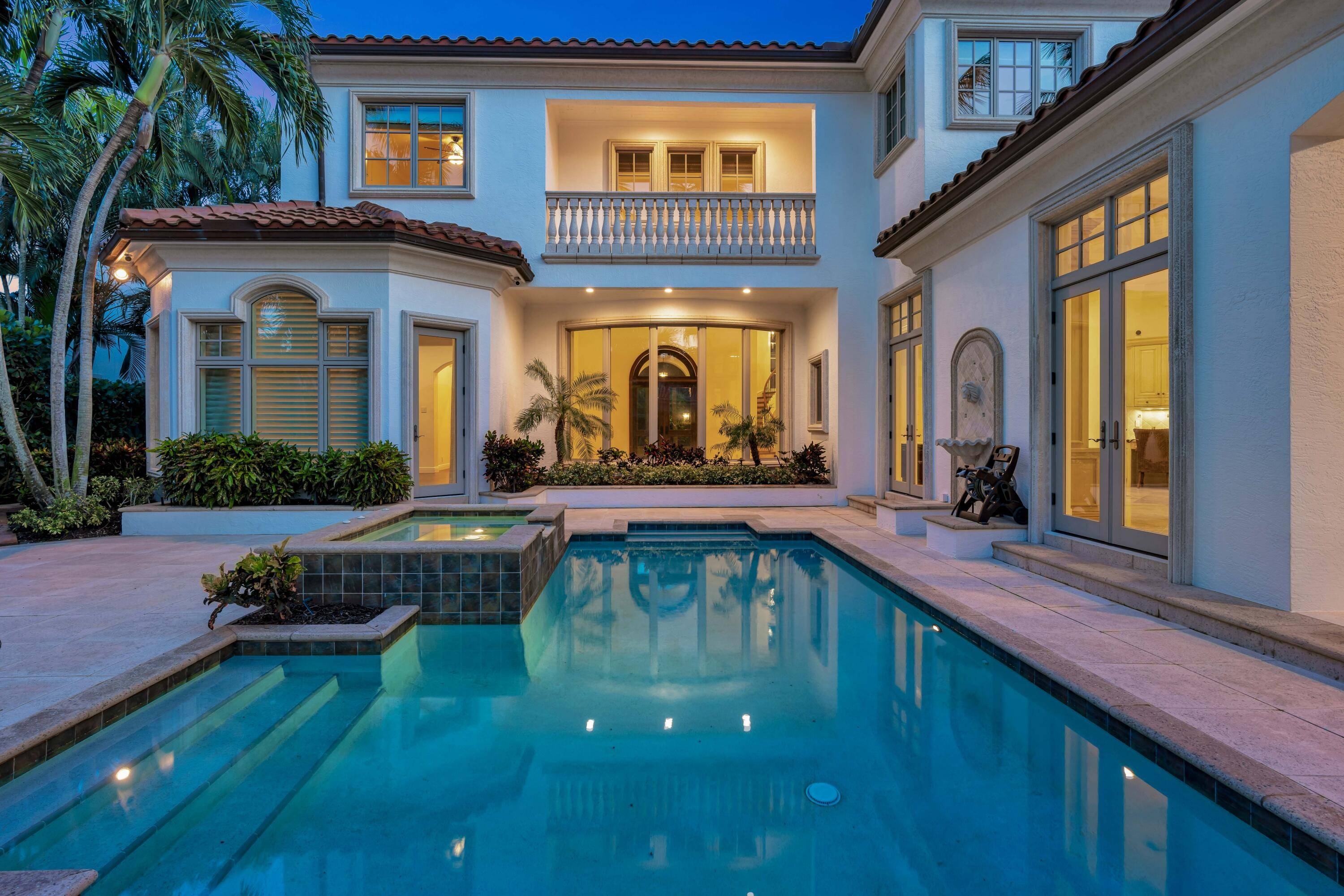 Welcome to this beautiful waterfront estate in the gated community of Harbour Isles in the heart of the Palm Beaches.