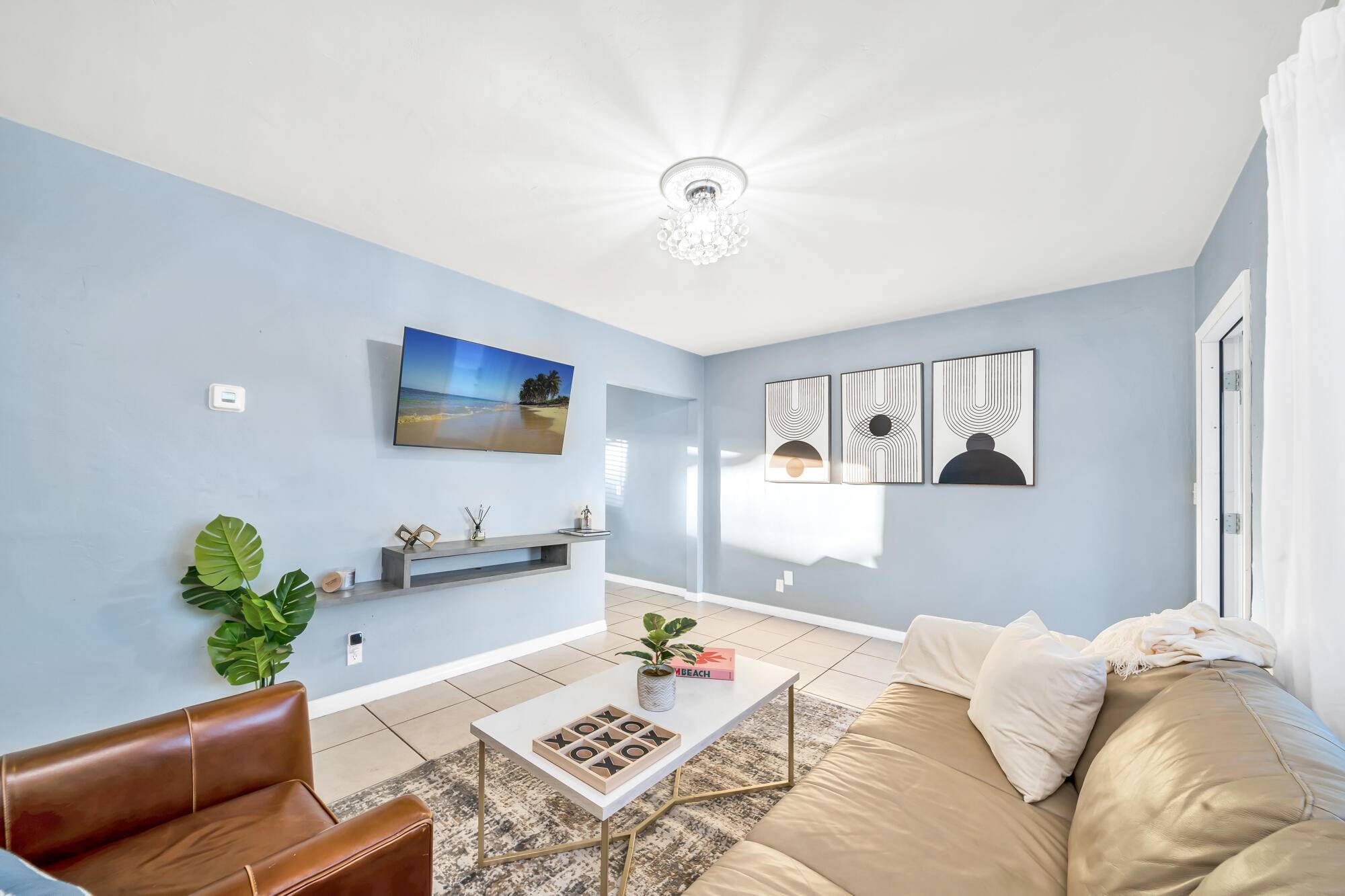 Fully furnished and remodeled classic, one story, 2BR 1BA beach home offered as a Seasonal Rental.