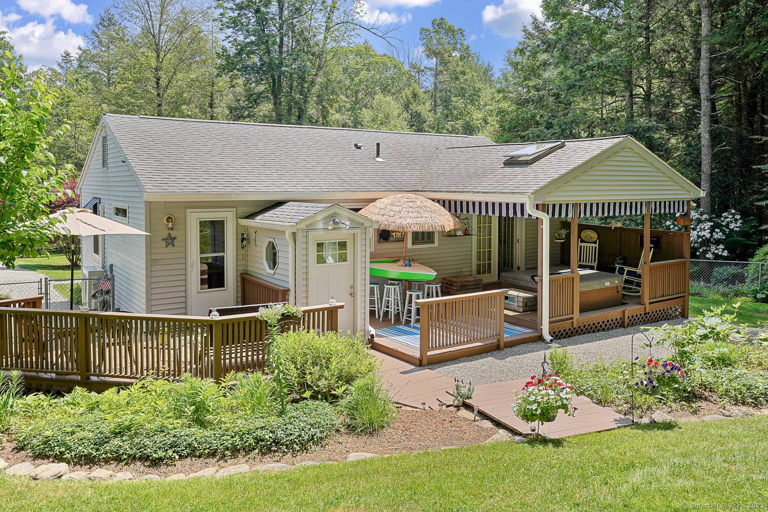 Welcome home to this charming 1, 412 sq ft ranch just a stone's throw from sparkling Lake Bunggee !
