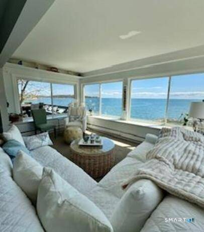 Charming 4 bedroom 2 bath direct waterfront colonial home in the heart of Short Beach Branford !