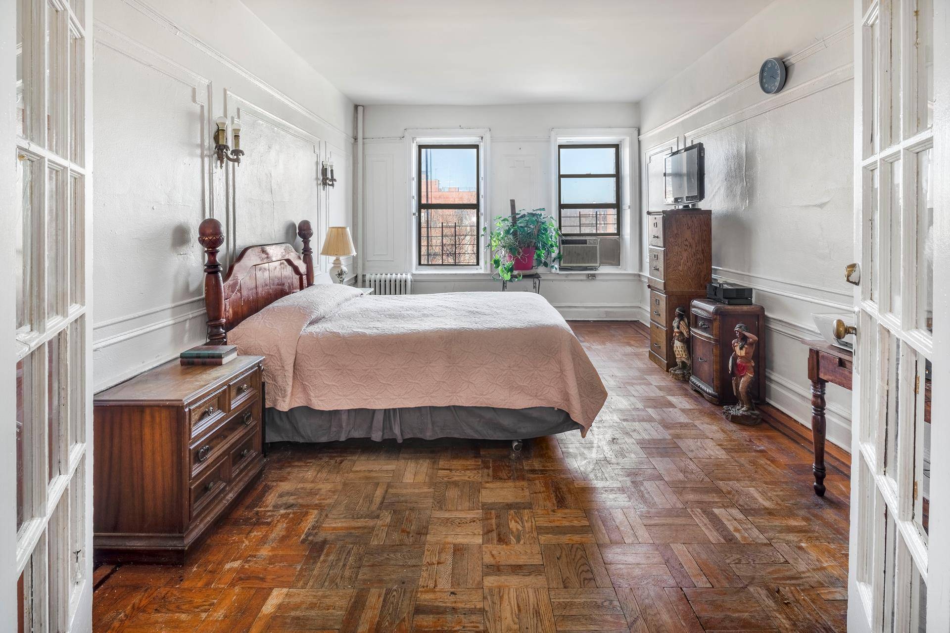 Sunny, spacious and airy, this true 3BR apartment boasts oversized rooms and endless potential.