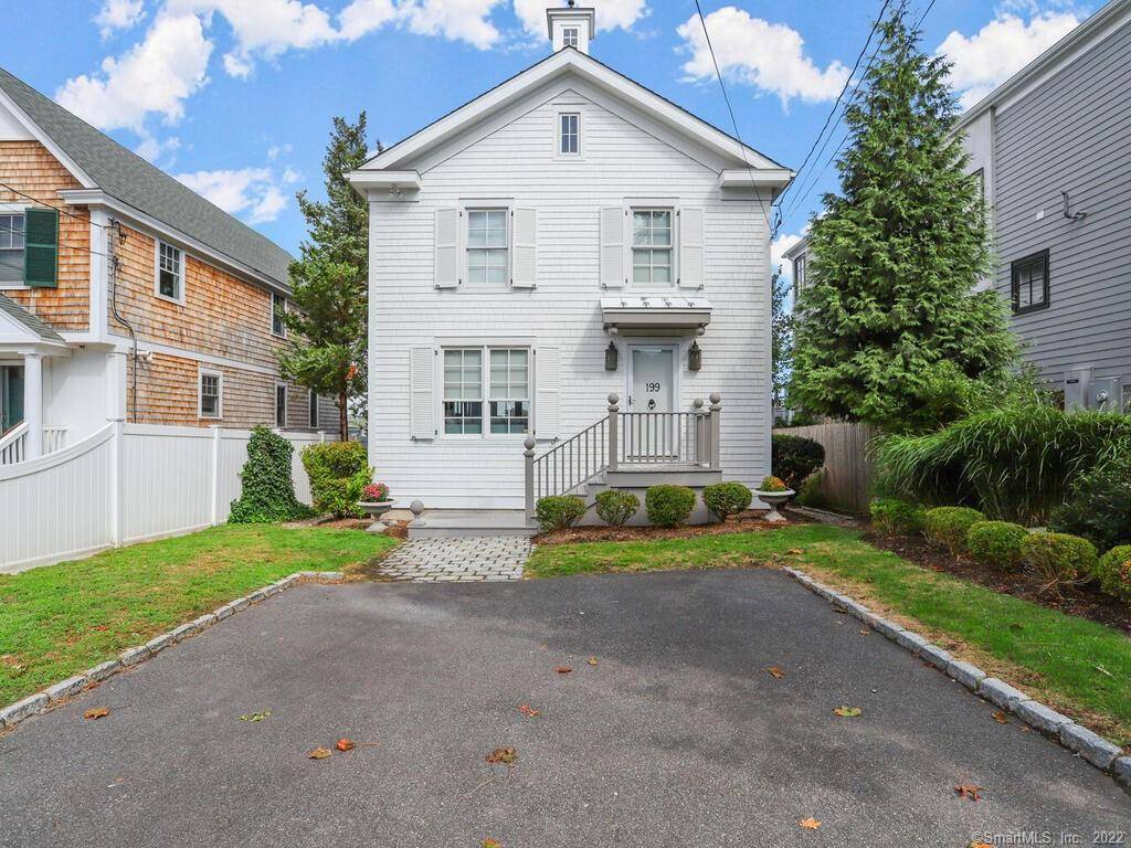 Stunning direct waterfront Nantucket style home overlooking Sherwood Mill Pond at Westport's Compo Beach.