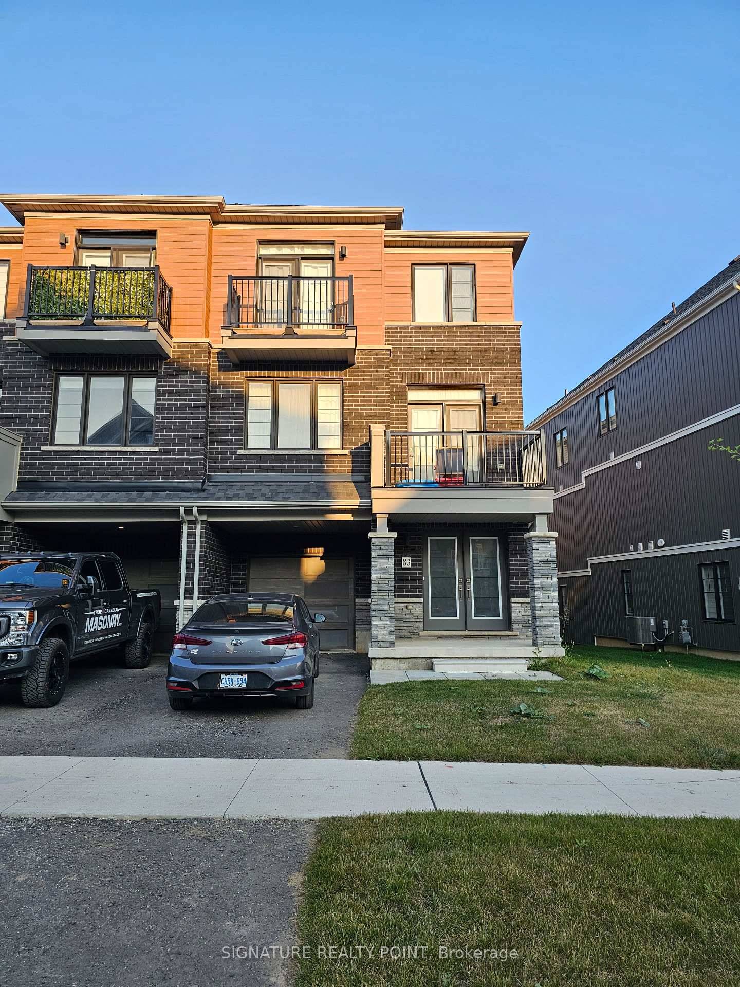 Brand new end unit townhome in beautiful Caledonia, on a pie shaped lot.