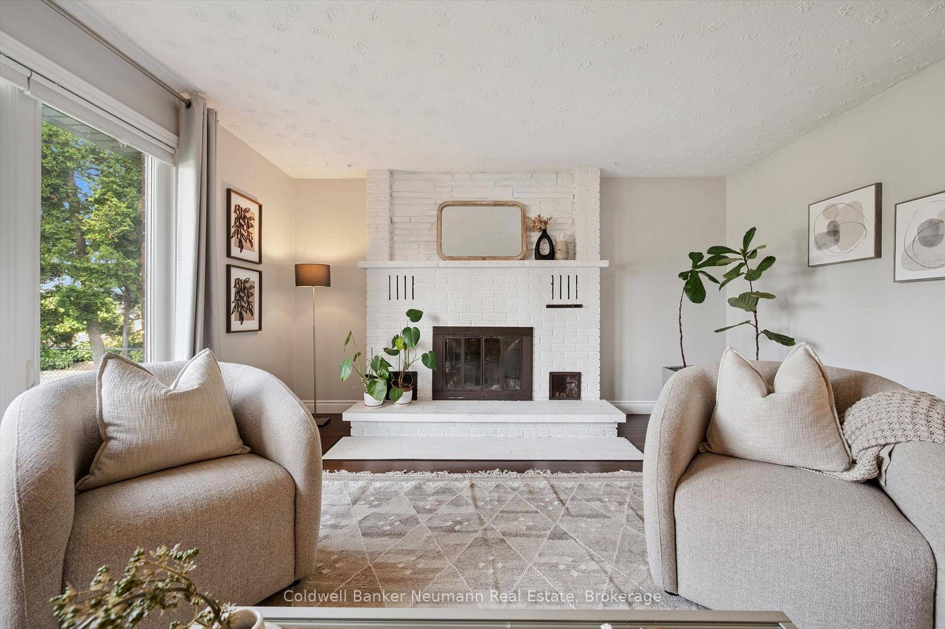 Charming red brick duplex with income potential in a prime Guelph location.
