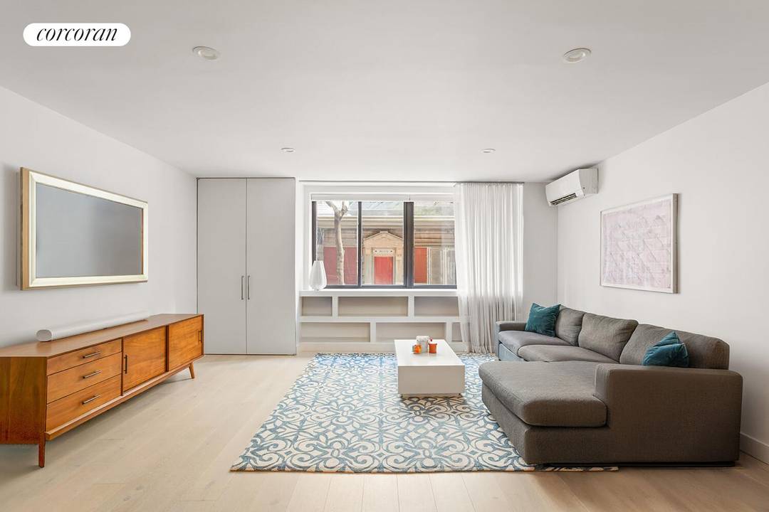 A home that offers the ease of condo living with the presence and privacy of a townhouse, Residence 1A is a renovated four bedroom, three bathroom duplex with over 2, ...