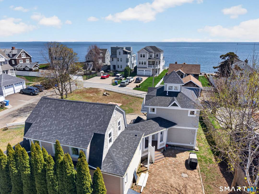 Luxury coastal living at 31 Sols Point Rd in Clinton, a fully renovated New England shoreline home on an oversized corner lot with unobstructed 180 degree water views of Long ...