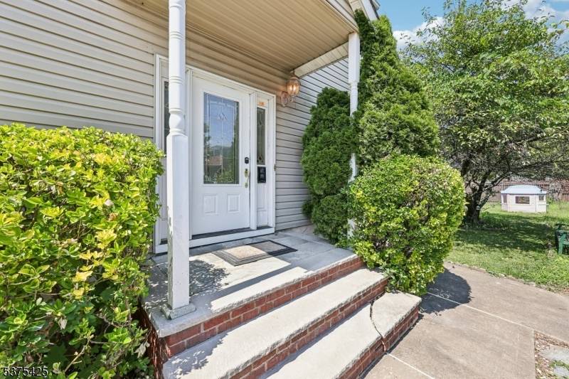 Spacious custom Colonial home located right on the Haledon border !