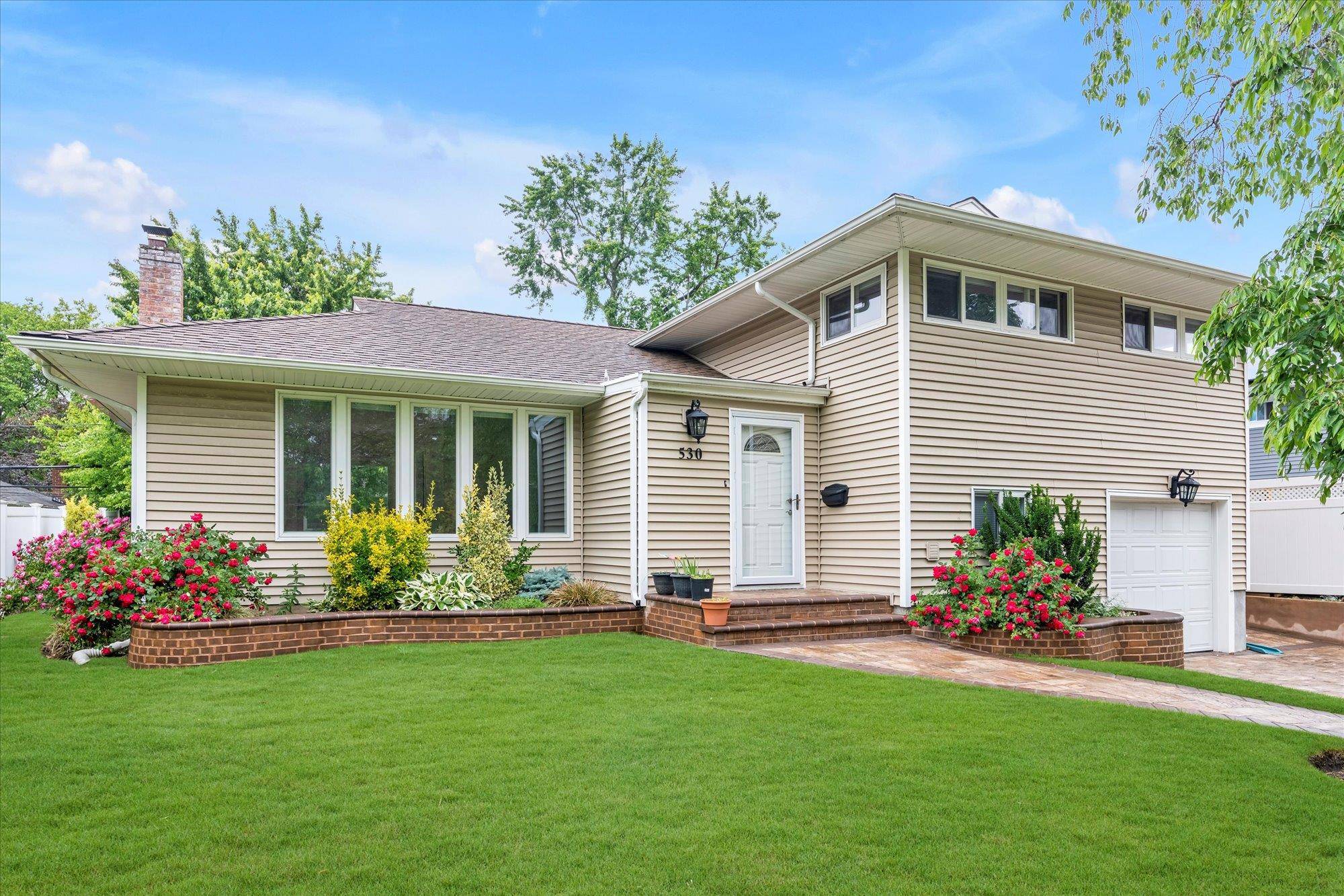 This Beautifully Renovated Split Level Home Offers Modern Comfort and Style.