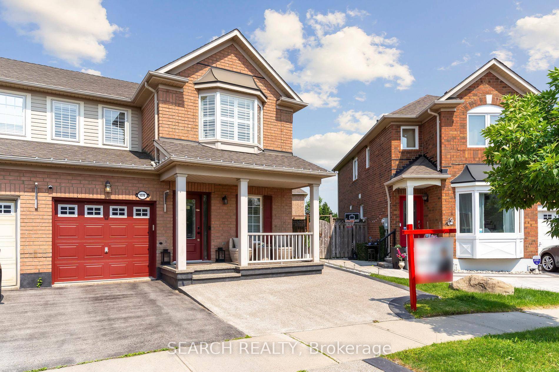 Welcome to 1078 Barclay Circle a standout semi that lives like a detached, set on a rare pie shaped lot that widens to 49.