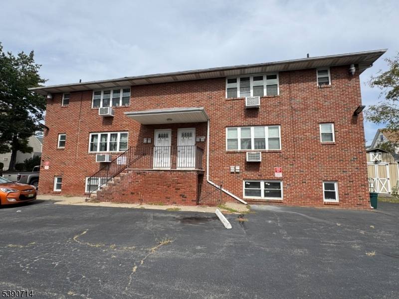 Exceptional 6 unit brick apartment complex featuring six 1 bedroom, 1 bath apartments.