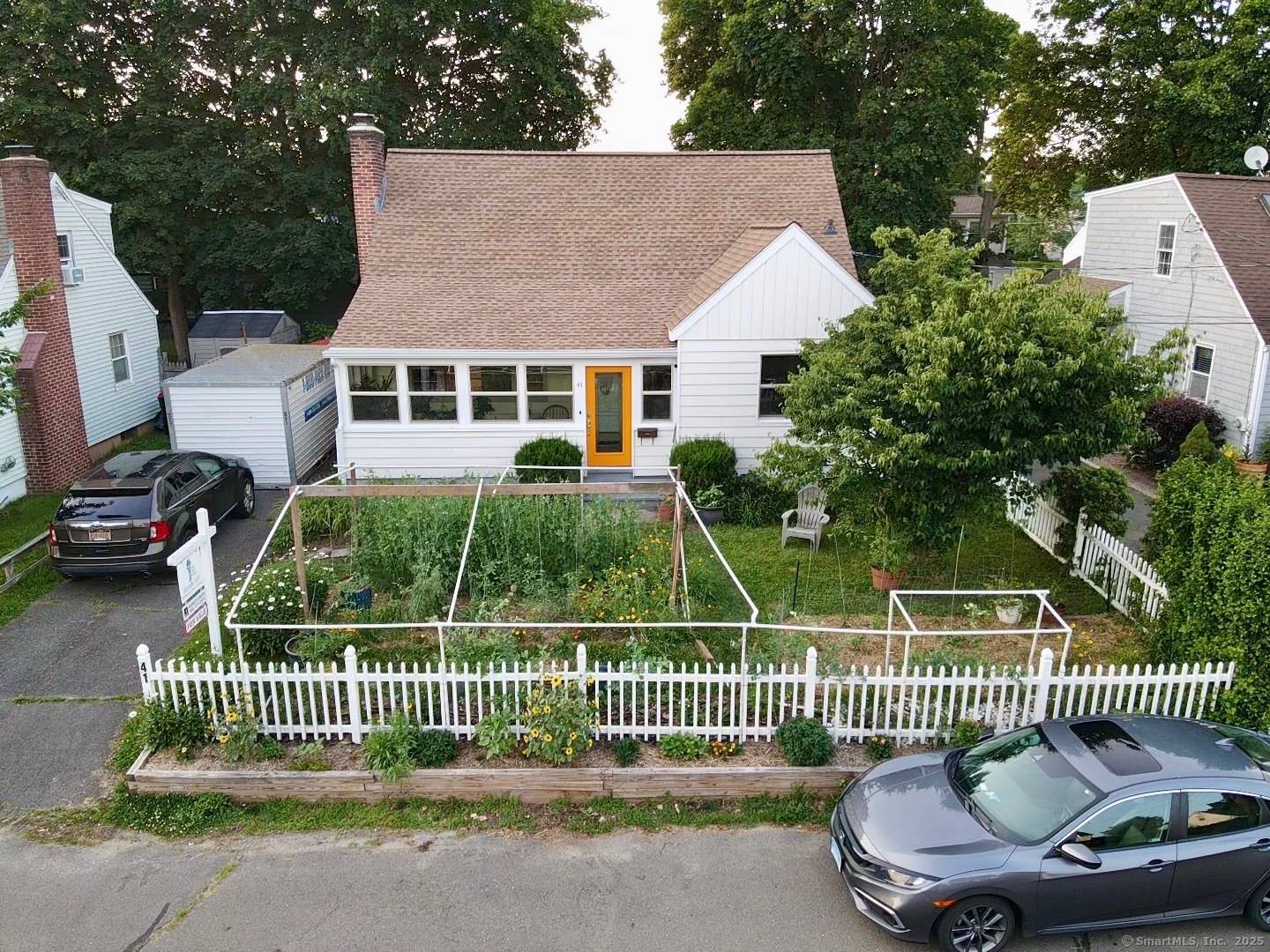 Recently updated with significant enhancements, this property offers main floor living featuring a new modern kitchen equipped with granite countertops, appliances, cabinets, and an island with seating.