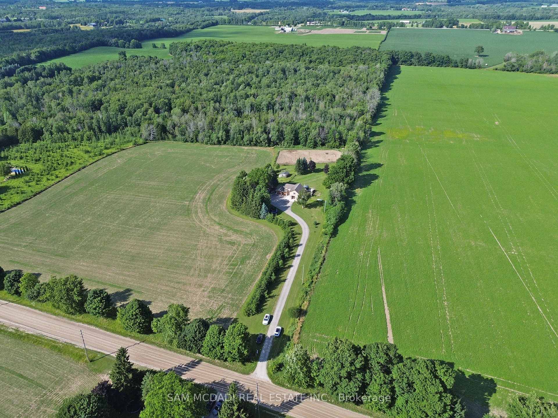 Come visit the tranquility of rural living on this stunning 47 acre property, where mature woodlands, open fields, and meandering trails create a picturesque setting for outdoor adventures and peaceful ...